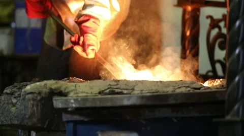 Pouring of molten iron Stock-Footage 61420392