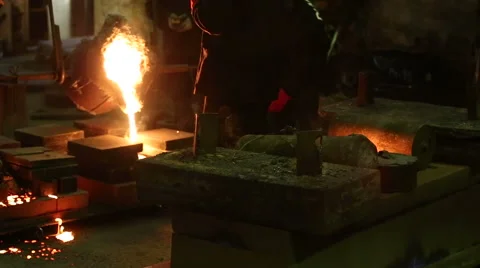 Pouring of molten iron Stock Footage 61423916
