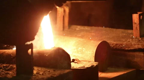 Pouring of molten iron Stock-Footage 61585296