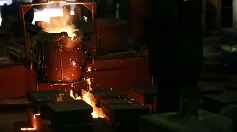 Pouring of molten iron Stock-Footage 61585477