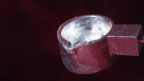 Pouring molten silver slow motion in forging shop Stock Footage 147356274