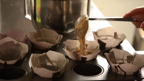 Pouring muffin batter 스톡 동영상 177756547