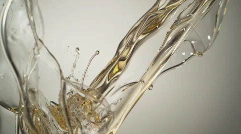 Pouring oil and making splashes. Slow Motion. Stock Footage 56698407