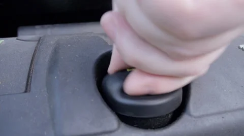Pouring oil into car engine Stock Footage 39570108