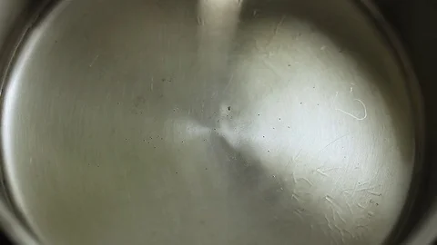 Pouring oil, speed-up shot Stock Footage