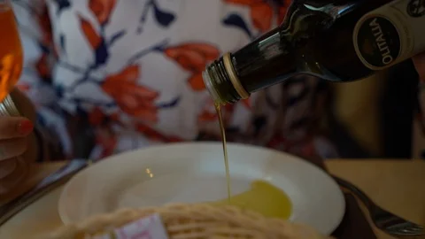 Pouring Olive Oil - Slow Motion Stock Footage