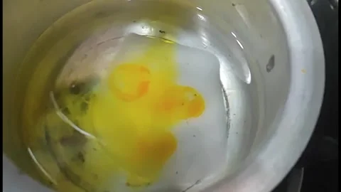 Pouring Orange colour Into Silver Pot of Melted Wax Slow Motion, Candle Crafting Stock Footage 340309319