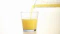 Pouring orange juice into the glass HD Footage