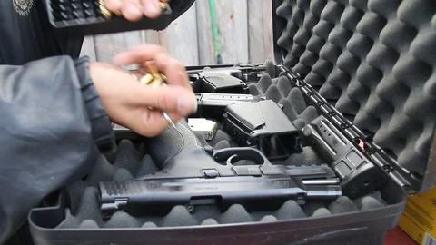Pouring out bullets Stock Footage 114215062