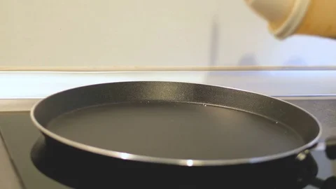 Pouring Pancake Batter In Pan Video stock 75807126