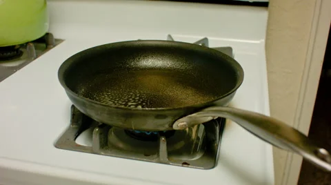 Pouring Pancakes into Pan Stock Footage 64722750