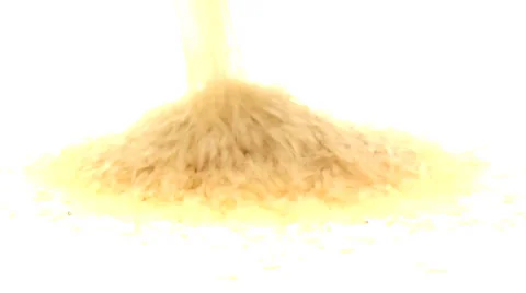 Pouring parboiled rice Stock Footage 32744338