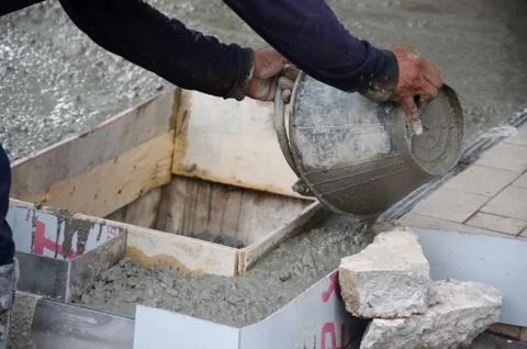 Pouring of plaster Stock Photos