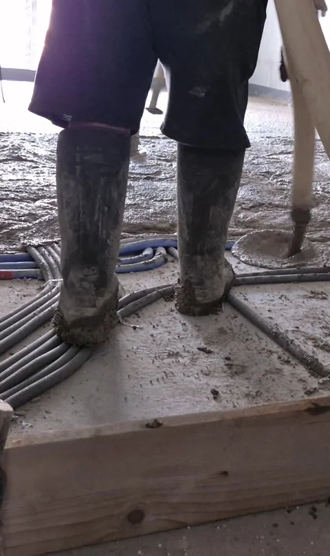 Pouring polystyrene concrete insulation floor vertical 9:16 Stock Footage 339363988