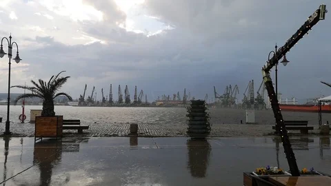 Pouring rain in open cafe on the seashore Stock Footage 107603587