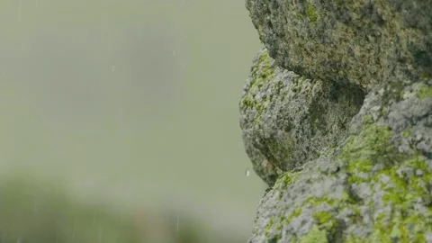 Pouring rain , water drops falling on rocks Stock Footage 142579834