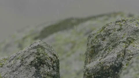 Pouring rain , water drops falling on rocks Stock Footage 144950291
