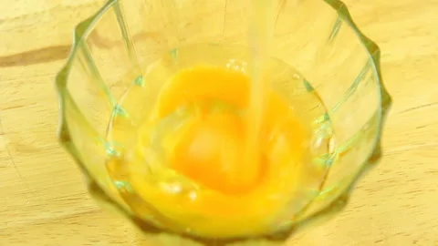 Pouring raw egg in bowl , in studio Chiangmai Thailand Stock Footage 155825580