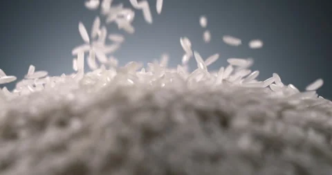 Pouring Raw White Rice Slow Motion Stock Footage 327445943