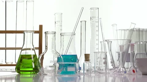 Pouring red liquid using a funnel Stock Footage 64291609