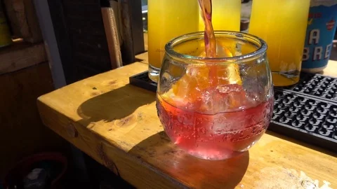 POURING RED SUMMER COCKTAIL Stock Footage