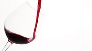 Pouring Red Wine Into Balloon Wineglass. Hd Cinemagraph Stock Footage