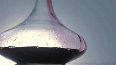 Pouring red wine in a decanter Stock Footage 99951890