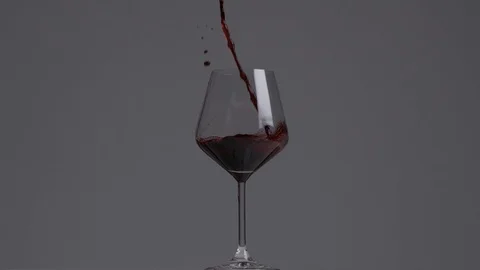 Pouring a red wine Stock Footage 101946314