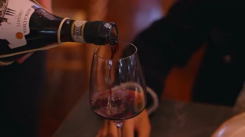 Pouring red wine Stock Footage 155198454