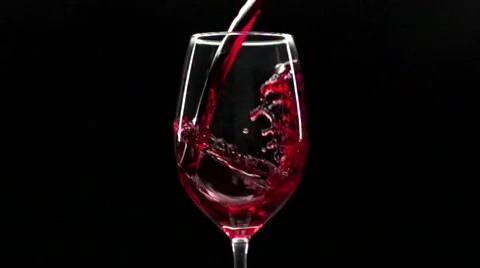 Pouring Red Wine Into a Glass, Black Bac... | Stock Video | Pond5