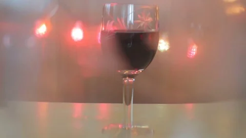 Pouring red wine into glass close up out of focus 스톡 동영상 75982753