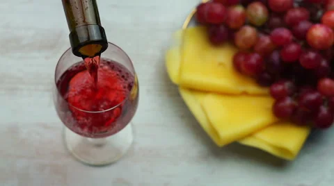 Pouring Red Wine Into Glass. 库存影片 68415506