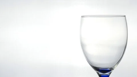 Pouring red wine into glass. Stock Footage 126758131