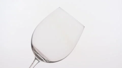 Pouring Red Wine Into A Glass, White Background Stock Footage 59182034