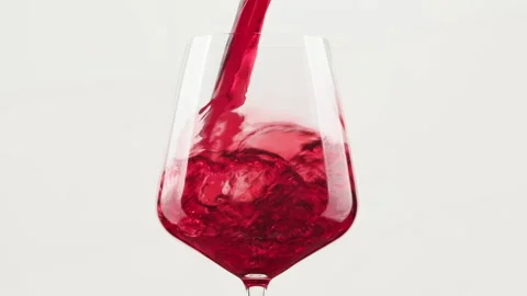 Pouring red wine into goblet. Close-up of filling wine glass with red wine Stock Footage 150268740