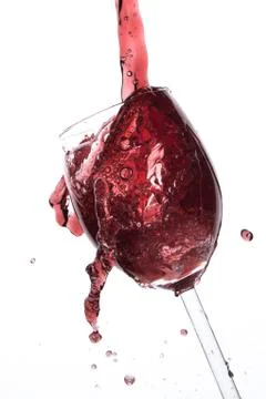 Pouring red wine Stock Photos