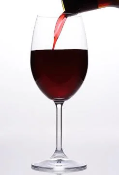 Pouring red wine Stock Photos