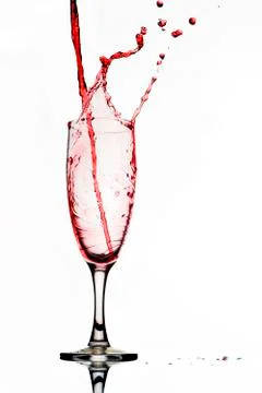Pouring red wine. Stock Photos