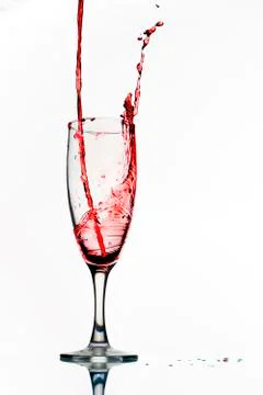 Pouring red wine. Stock Photos