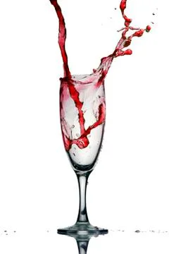 Pouring red wine. Stock Photos