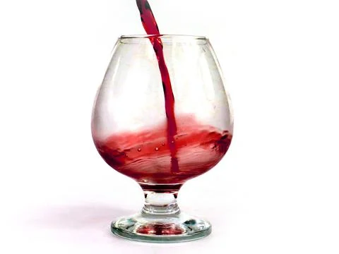 Pouring red wine Stock Photos