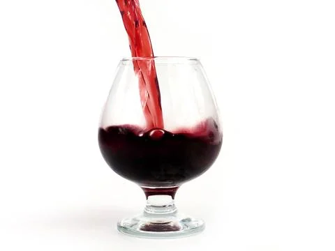 Pouring red wine Stock Photos