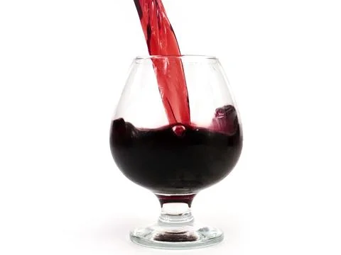 Pouring red wine Stock Photos