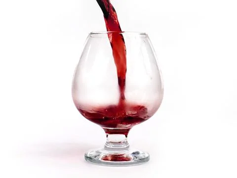 Pouring red wine Stock Photos