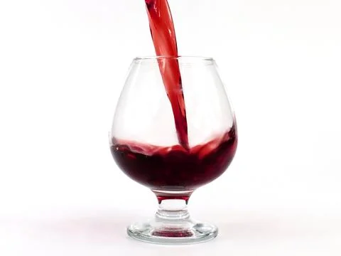Pouring red wine Stock Photos