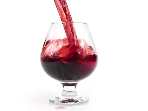 Pouring red wine Stock Photos