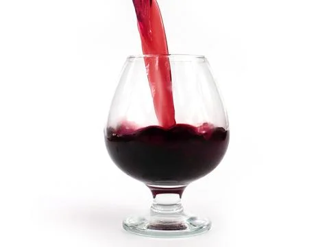 Pouring red wine Stock Photos