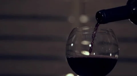 Pouring red wine in slow motion Stock Footage 67857354