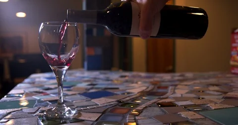 Pouring red wine in slow motion 2 Stock Footage 87342154