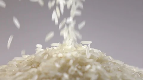 Pouring rice slow motion Stock Footage 102216463